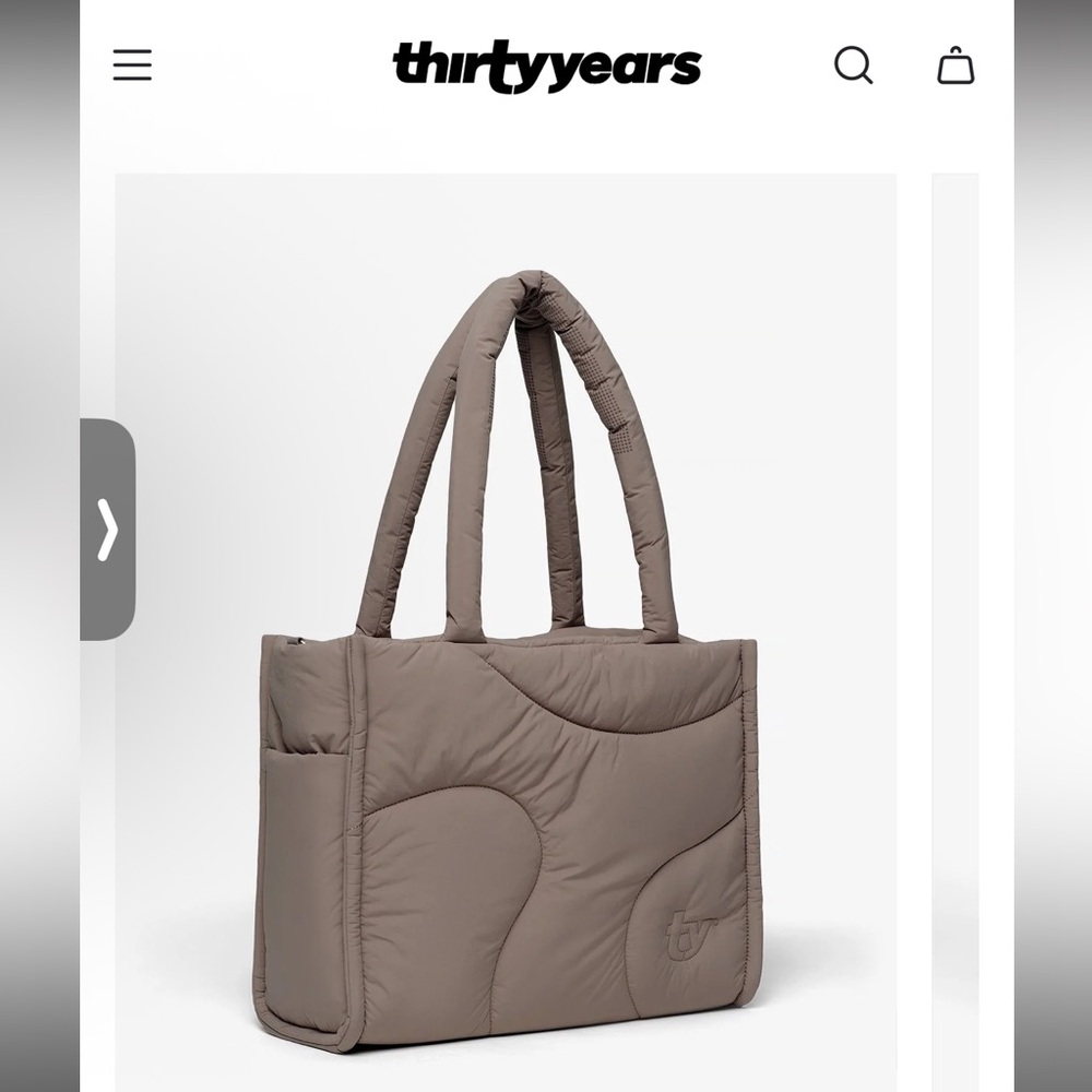 Brown Structured Tote Bag with Embossed Patterns
